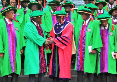 Vice Chancellor Professor Abiodun H. Adebayo Congratulating Professor Solomon Oranusi After The Lecture