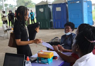 A Female Student Getting Registered