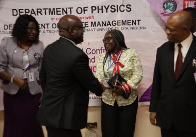 Deputy Vice Chancellor Professor Olujide Adekeye Congratulating The Keynote Speaker